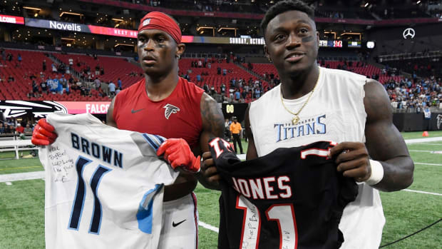 Atlanta Falcons wide receiver Julio Jones (11) and Tennessee Titans wide receiver A.J. Brown (11) exchange jerseys after the Titans' 24-10 win at Mercedes-Benz Stadium Sunday, Sept. 29, 2019 in Atlanta, Ga.